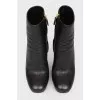 Heeled boots with metal inserts