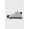 Gray textile sneakers with leather toes