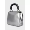 Silver leather satchel bag