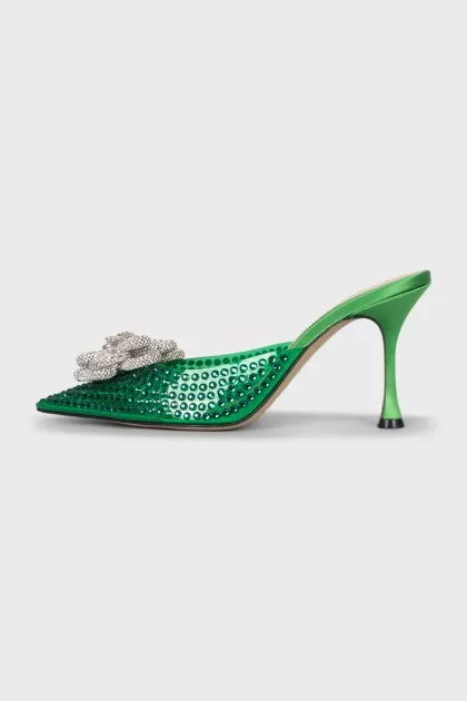 Green mules decorated with rhinestones