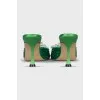 Green mules decorated with rhinestones