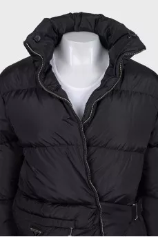 Black down jacket with zip pockets and tag