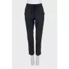 Tapered trousers with drawstrings