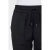 Tapered trousers with drawstrings