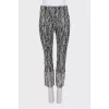 Cropped mid-rise trousers with a printed pattern