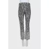 Cropped mid-rise trousers with a printed pattern