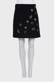 Straight skirt decorated with beads
