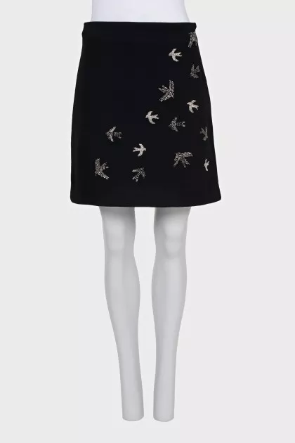 Straight skirt decorated with beads