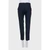Tapered trousers with contrasting stripes