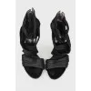 Sandals with a zipper at the heel