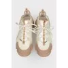 White-brown sneakers on laces