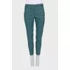 Cropped printed trousers with a crease