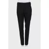 Black wool trousers with stripes
