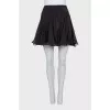 A crop top and mini skirt outfit