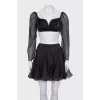 A crop top and mini skirt outfit