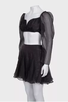 A crop top and mini skirt outfit