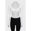 White top with tag