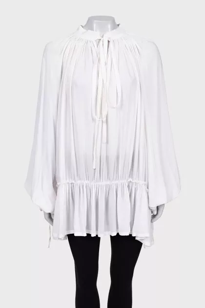 Loose blouse with ties