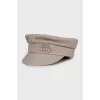 Gray cap with embroidered brand logo