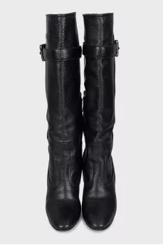 Leather boots with a silver buckle