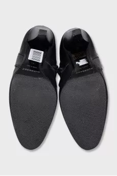 Leather boots with a silver buckle