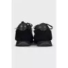Men's black sneakers made of textile and leather