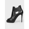 Ankle boots with cutouts and peep toe