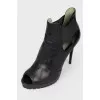 Ankle boots with cutouts and peep toe