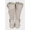 Suede boots decorated with python skin