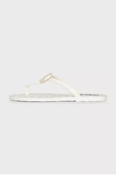 Rubber flip flops with a brand logo