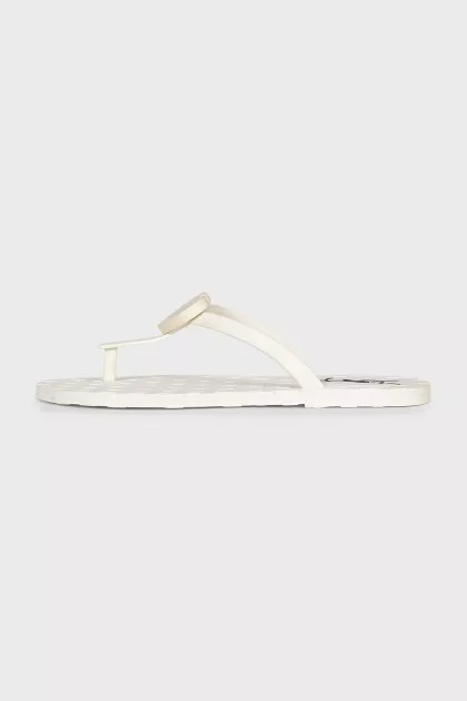 Rubber flip flops with a brand logo