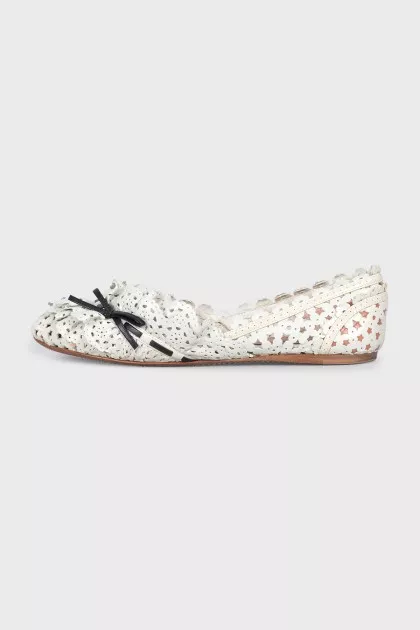 White leather ballet flats with perforations