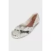 White leather ballet flats with perforations