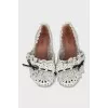 White leather ballet flats with perforations
