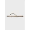 Golden leather flip flops
