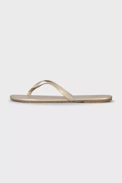 Golden leather flip flops