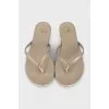 Golden leather flip flops