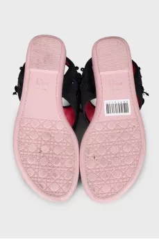 Textile flip-flops with black decor