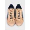 Leather sneakers with denim inserts