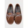 Leather loafers with contrast laces