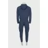 Men's suit consisting of a hoodie and trousers with pockets