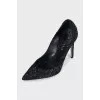 Black pumps with rhinestones