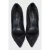 Black pumps with rhinestones