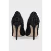 Black pumps with rhinestones