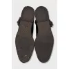 Black suede boots lined with fur