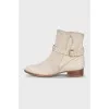 Suede boots with a leather belt