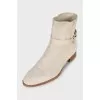 Suede boots with a leather belt