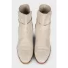 Suede boots with a leather belt