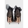 Suede shoes decorated with mesh