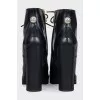 Black ankle boots with massive decor